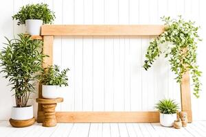 Wooden Frame with Plants and White Wall photo