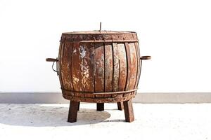 Rusty Barrel on Sand photo