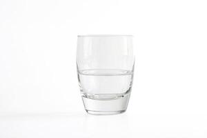 Glass of Water on White Background photo