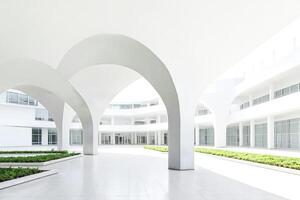 Minimalist Modern Architecture With White Arched Columns photo