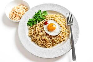 Spaghetti with Fried Egg and Parsley photo