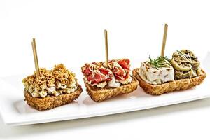 Assorted Appetizers on a White Plate photo