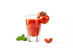 Fresh Tomato Juice with a Slice of Tomato and Basil photo