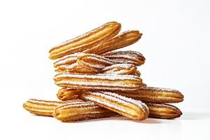 Close-up of a Stack of Churros Covered in Powdered Sugar photo