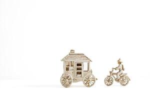 White Carriage and Bicycle Toy on White Background photo