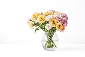 Bouquet of flowers in a vase on a white background photo