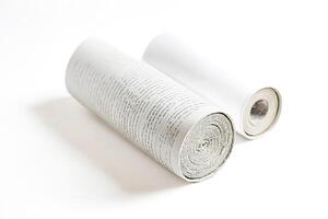 Rolled up paper with text on it photo