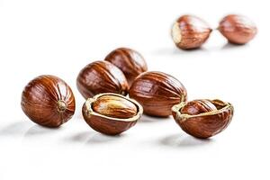 Close Up of Hazelnuts on White Background photo