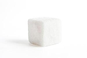 Single Sugar Cube Isolated on White Background photo