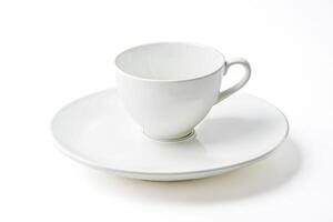 Empty white cup and saucer photo