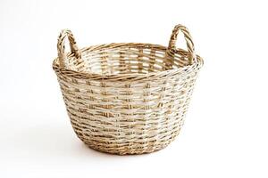 Woven Basket with Handles Isolated on White Background photo