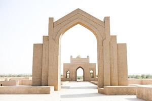 Ancient Archway Leading to a Mosque in the Desert photo