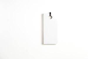 Blank White Tag with Hole and Black String photo