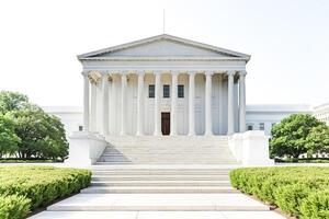 White Neoclassical Building with Columns and Steps photo