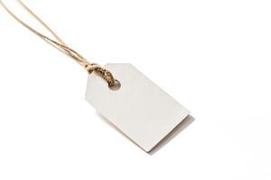 Blank Paper Tag with String on White Background photo