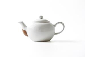 White Teapot with Brown Handle photo