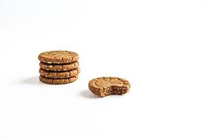Stack of Cookies with a Bitten Cookie photo