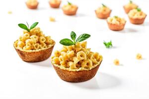 Close-up of Macaroni and Cheese Bites with Basil Garnish photo