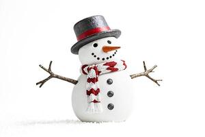 Snowman with Top Hat and Scarf Isolated on White Background photo