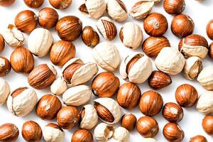 Close up of hazelnuts on white background photo