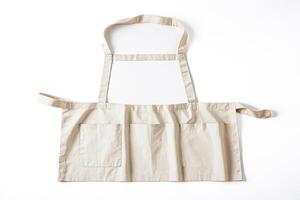 Beige Apron with Pockets Isolated on White Background photo