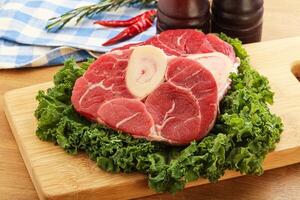 Raw ossobuco beef meat for cooking photo