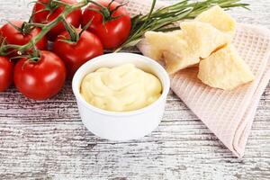 Cheese sauce in the bowl photo