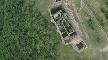 Aerial overhead view The Skhvilo fortress or Skhvilo castle. Medieval fortress in region of Shida Kartli, in Kaspi District, Georgia. 14th century. Served as residence of the duke family Amilakhor video