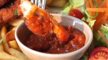 Enjoy a delicious dish of Shrimp in Spicy Sauce with Crispy Fries and Fresh Salad video