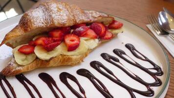 Enjoy a delectable Croissant filled with Strawberries, Bananas, and a decadent Chocolate Drizzle video