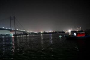 Landscape of Second Hooghly Bridge or Vidyasagar Setu at Night photo