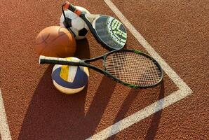 High Angle View Of Various Sport Equipments On playground photo