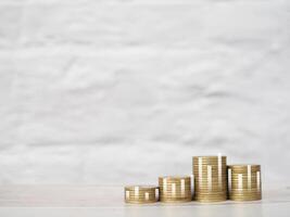 Stack of coins with virtual increasing graph. The concept of business growth, Financial investment, Market stock, Profit return, Dividend and Business fund photo