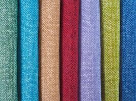Colorful background, A stack of colorful fabric. Full frame shot of multi colored fabric background photo