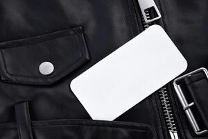 Black leather jacket with white tag and LC Waikiki logo. photo