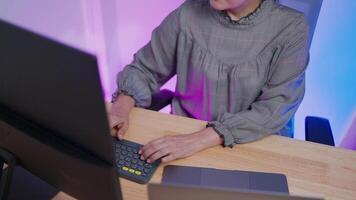 Hands typing on computer keyboard. Digital technology. Software development concept. Female programmer writes code Software engineer working on laptop with circuit board and javascript on virtual scre video