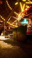 Illuminated Carousel in Abandoned Nighttime Amusement Park video