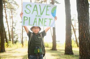 demonstration against global warming and pollution. Child boy making protest about climate change, plastic problems, global warming, pollution. Save the planet poster. Climate Strike. Eco Activism. photo