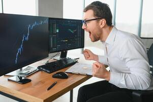 Stressed business man crypto trader broker investor analyzing stock exchange market crypto trading decreasing chart data fall down loss, desperate about losing money of crisis, recession, inflation. photo