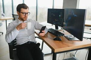 Successful trader in formalwear checking cryptocurrency information data on finance market graph, working in office photo
