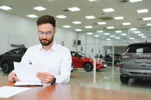 I have a new car. client signing car lease form. photo