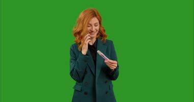 Female takes pregnancy test and makes call on smartphone entusiastic. video