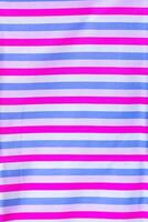 Thai silk with beautiful patterns and a high price because silk is added using ancient methods to produce fibers and weaving with ancient weaving machines resulting in beautiful patterned silk. photo