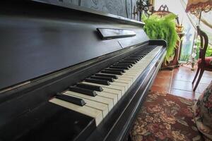 Beautiful piano background are set by the window in the morning waiting for the pianist to come to practice in the morning to reduce the mistake of having to perform the piano performance at a concert photo