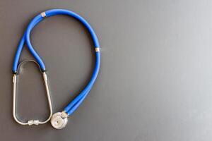 image blur doctor's stethoscope is prepared when it comes to emergencies, when there is an accident patient or the patient is unconscious because the stethoscope is used to listen to the heartbeat. photo