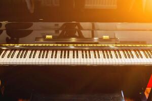 Beautiful piano background are set by the window in the morning waiting for the pianist to come to practice in the morning to reduce the mistake of having to perform the piano performance at a concert photo