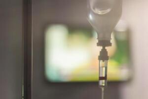 Soft Light and Blur,The patient is being given saline solution due to the debilitating corona virus infection and the coronavirus compromises the immune system and respiratory disorders. photo