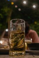 The silhouette of a beer mug placed on a table in the pub is a beer mug prepared for tourists as beer is a popular drink and helps to relax after work. photo