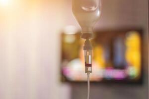 Soft Light and Blur,The patient is being given saline solution due to the debilitating corona virus infection and the coronavirus compromises the immune system and respiratory disorders. photo