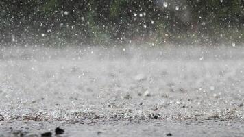 The rain was falling on the roadway due to a precipitation that was forming after the depression hit Thailand, causing heavy rains in some areas and flooding the road surface. photo